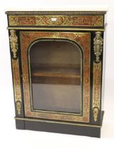19th Century buhl work pier cabinet having white flecked marble top with arch top door, on plinth