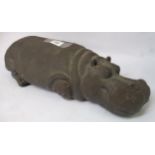 Gail Runyon Perry, dark patinated terracotta figure of a recumbent hippopotamus, 46cm long