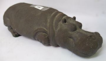 Gail Runyon Perry, dark patinated terracotta figure of a recumbent hippopotamus, 46cm long