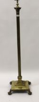 Good quality brass Corinthian column standard lamp on stepped base with claw and ball feet, 165cm