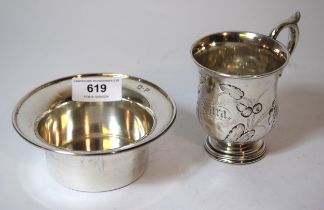 Sterling silver shallow bowl together with a white metal floral embossed Christening mug