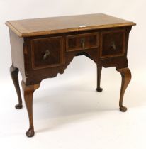18th Century walnut and herringbone inlaid lowboy, the moulded top above three freize drawers,