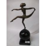 Coppered patinated metal Art Deco figure of a dancing girl on ebonised marble plinth base, 33cm high
