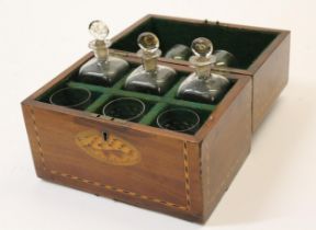 19th Century mahogany shell and chequer inlaid six division decanter box, with three original