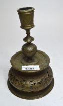19th Century Continental brass candlestick in antique style, with pierced embossed decoration,