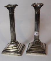 Pair of Victorian silver Corinthian column candlesticks, 18cm high, Sheffield 1884, with weighted