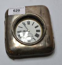 Silver cased travel clock containing a nickel plated Goliath pocket watch this watch has a