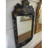 20th Century Chinese black lacquered chinoiserie decorated rectangular wall mirror with shaped