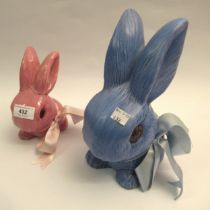 Large Sylvac pottery figure of a rabbit in blue, together with a similar smaller figure in pink (