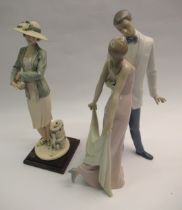 Lladro group of a man and woman in original box, together with a Florence Giuseppe Armani figure