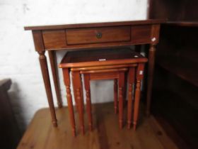Nest of three reproduction occasional tables, similar oval occasional table and a side table with