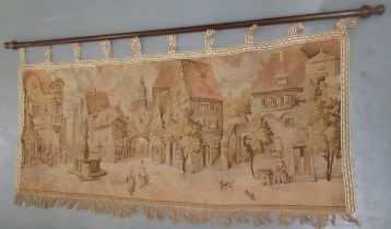 Machine woven tapestry, village scene, hanging from a turned wooden pole