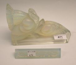 Sabino glass bookend, in the form of a turkey and a glass advertising sign by Sabino (both at fault)