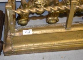 Edwardian brass fire kerb with integral tool holders