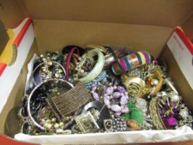Box containing a large quantity of various costume jewellery, necklaces etc.