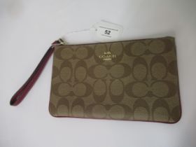 Coach, small wristlet in signature canvas, 19 x 12 x 1cm Very good condition