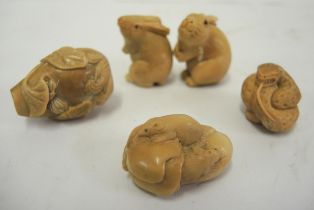 Carved netsuke in the form of two rats, together with four other carved figures of animals and a