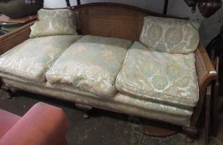 1930's Walnut Bergere sofa with floral upholstered loose cushions