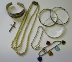 Quantity of various silver bangles, two silver bracelets, pendant cross and a simulated pearl