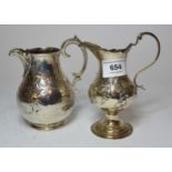 George III London silver floral embossed pedestal cream jug with 'C' scroll handle and later