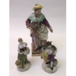 19th Century Continental porcelain figure of a flower seller (restored), together with two other