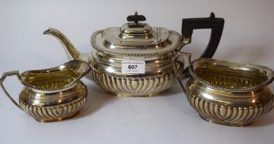 20th Century Sheffield silver three piece half fluted design tea service, 39oz t