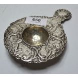 Dutch white metal figural embossed tea strainer