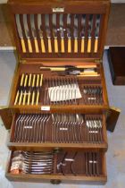 Silver plated twelve place setting canteen of Old English pattern cutlery in an oak cabinet (