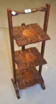 Brass inlaid carved hardwood three tier folding cake stand In good condition