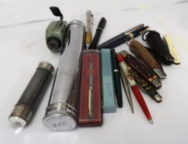 Five various pen knives, three early torches and a small quantity of pens and pencils