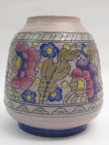 Crown Ducal Charlotte Rhead baluster form vase with a stylised floral design on a mottled ground,