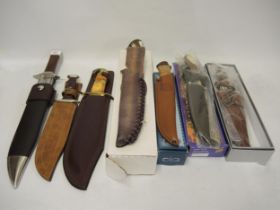Seven reproduction hunting knives including Carl Linder and Tree Brand, some in original boxes