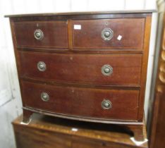 Edwardian mahogany bow front chest of two short over two long drawers, on splay supports, 80cm