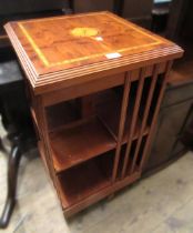 Reproduction yew wood and inlaid revolving bookcase