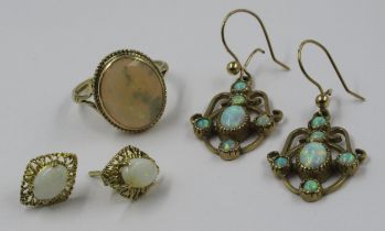 9ct Gold oval opal set ring, together with a pair of opal set eardrops and another pair of opal