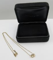 Tiffany & Company, 18ct gold coffee bean pendant necklace, 3.5g, in a Tiffany box