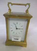 Good quality Mappin & Webb gilt brass carriage clock, the enamel dial with Roman numerals , with a