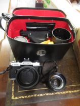 Two Fujica ST605N cameras together with a quantity of other cameras, lenses and accessories
