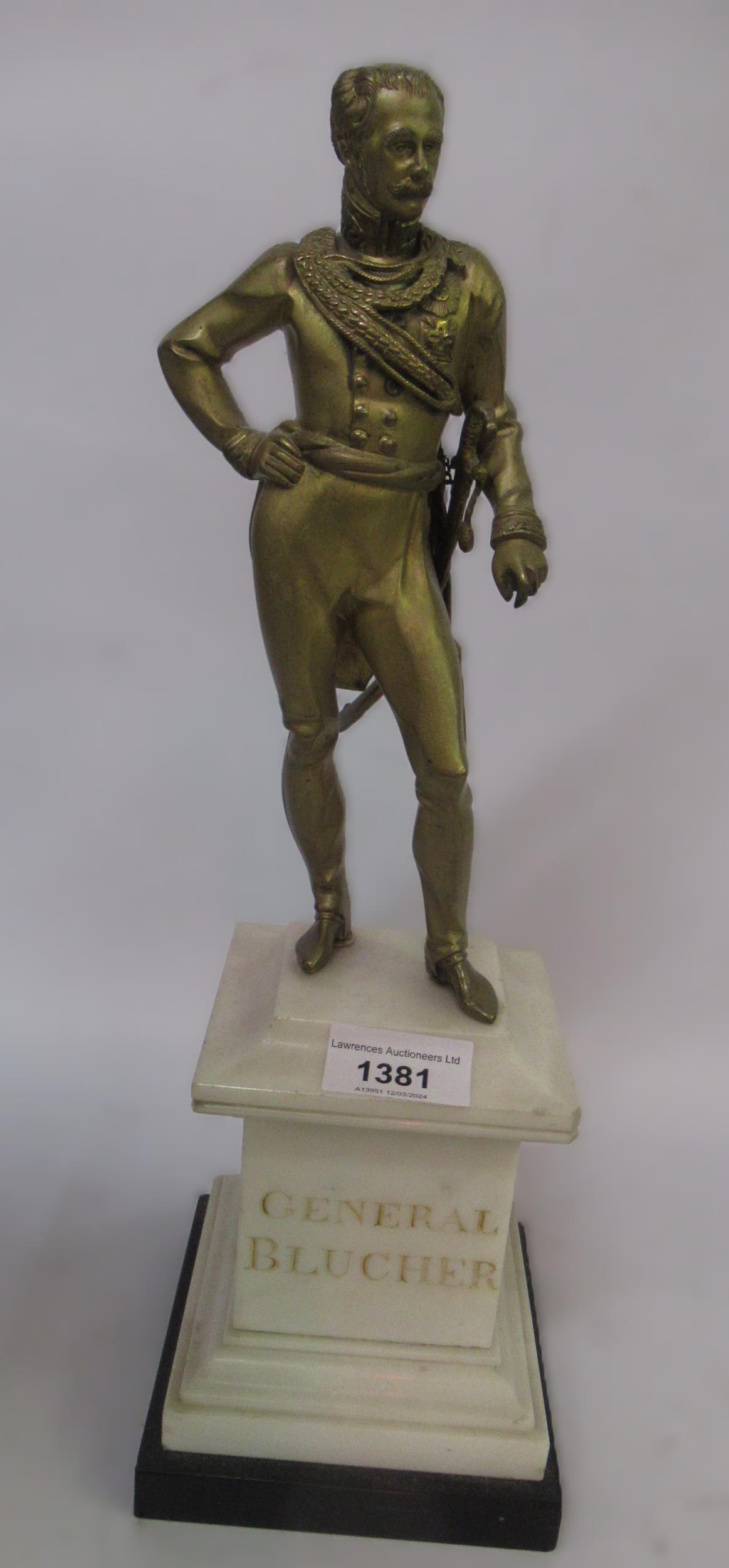 19th Century gilt bronze figure of General Blucher, on a white marble and black slate plinth, 37cm