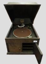 HMV oak cased table model wind-up gramophone, together with a quantity 78 speed records and a