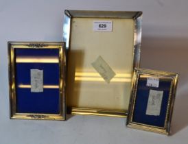 Three various Continental silver photograph frames, largest 20 x 15cm