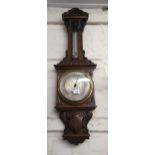 Good quality Victorian carved walnut aneroid barometer thermometer with silvered dials