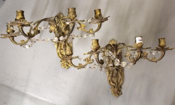 Pair of 19th Century French ormolu and crystal four branch wall lights, 29cm high