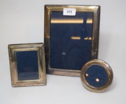 Three silver mounted photograph frames, together with a quantity of silver plated photograph frames