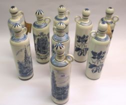 Group of nine 20th Century Dutch blue and white pottery decanters