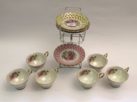 Japanese floral decorated porcelain tea service with pierced borders