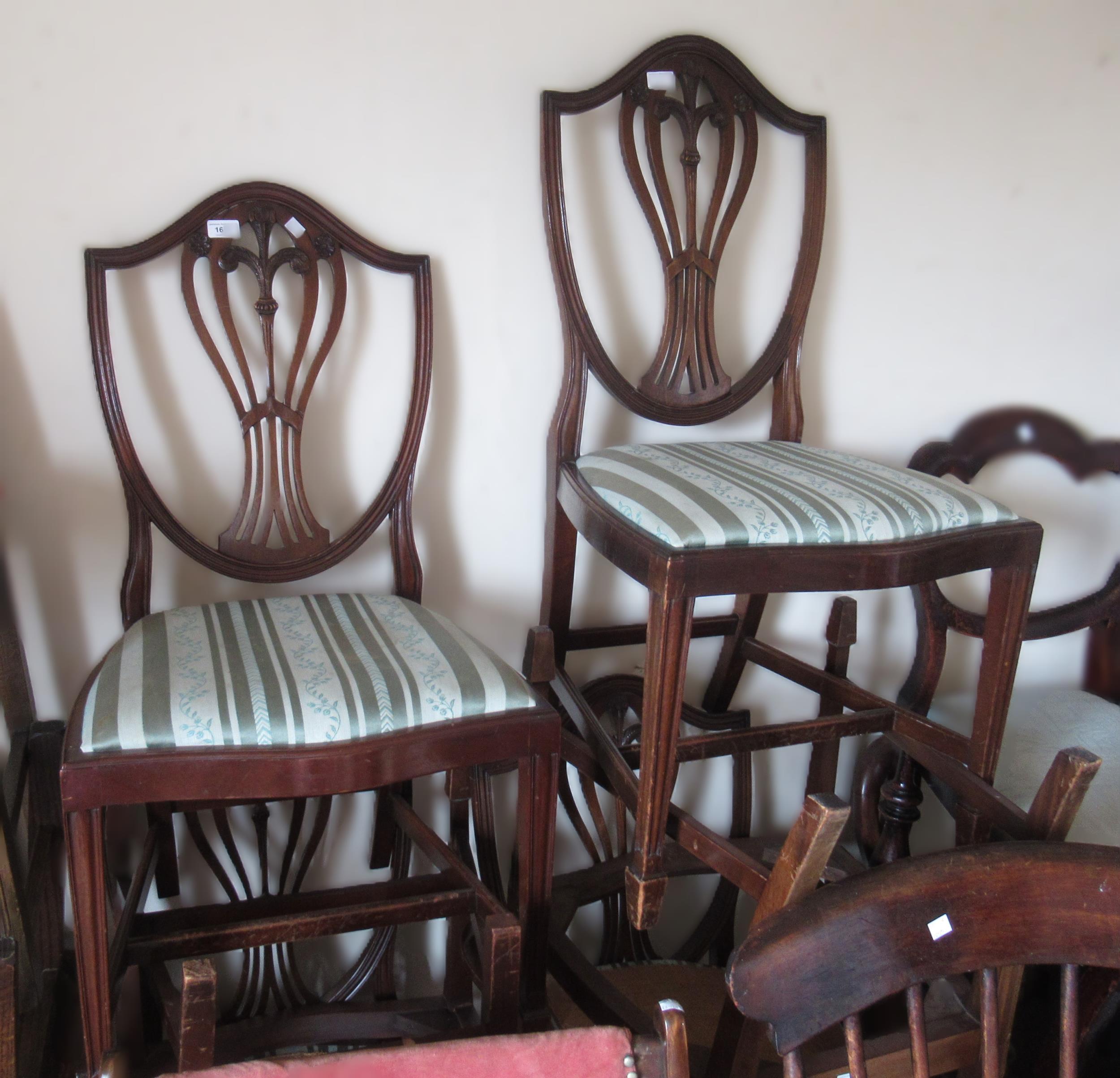 Set of six (four plus two) mahogany Hepplewhite style dining chairs, together with an oval