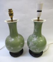 Pair of Chinese baluster form pottery table lamps, together with two alabaster table lamps