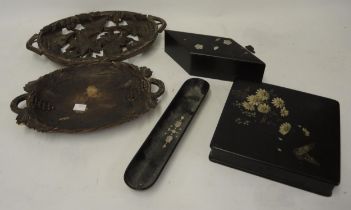 Two oval Black Forest carved wooden dishes, two lacquered boxes and a pen tray