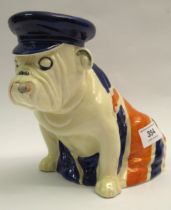 Royal Doulton figure of a seated British Bulldog draped in a Union Jack (restoration to blue cap)